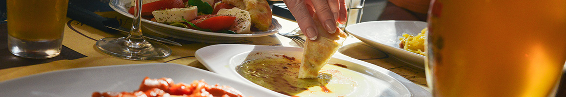 Eating Greek Mediterranean at Yanni's Modern Mediterranean restaurant in Albuquerque, NM.